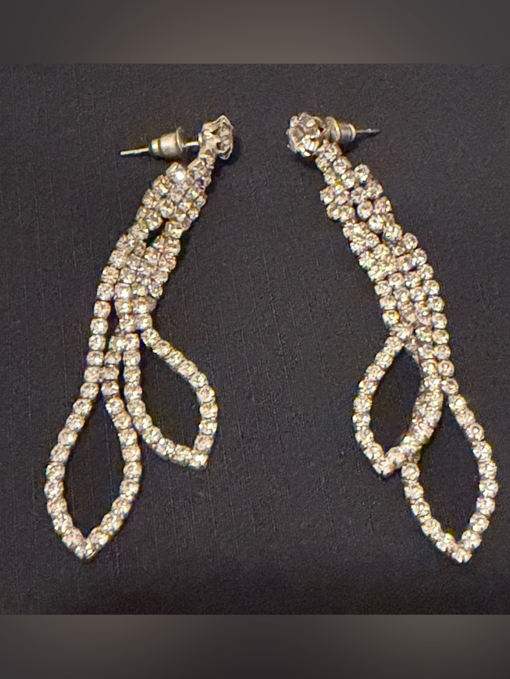 Bling Alert! Dangling Rhinestone Earrings in Silver setting.
